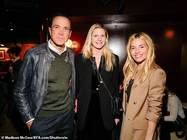 Sienna was also joined by Karen Duffy (centre) at the glitzy bash.