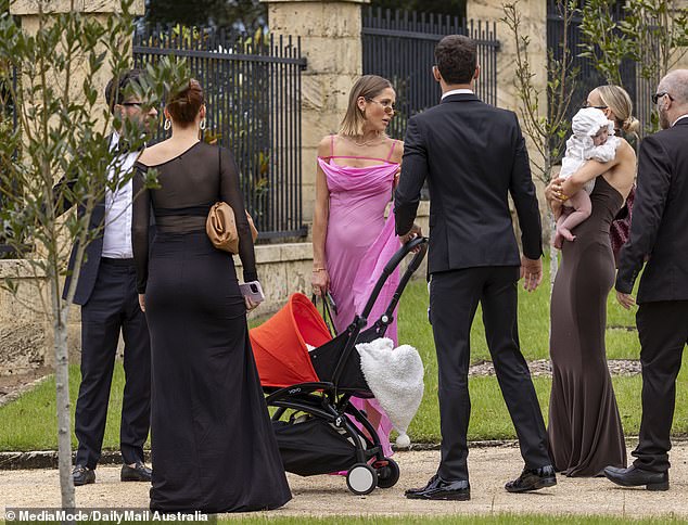 The Perth-based influencer, 30, was seen cradling her three-month-old daughter Isla as she celebrated Tammy marrying her Love Island Australia partner Matt Zukowski at Chateau Du Soleil