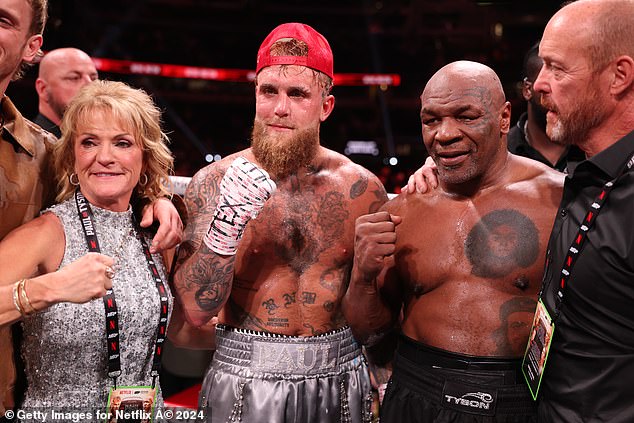 Jake Paul (left) and Tyson (right) have both since been officially banned from boxing