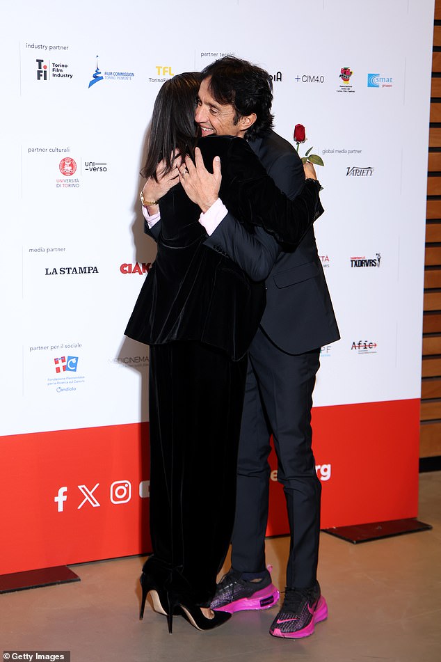 In the snap, the star can be seen sharing a sweet hug with Giulio as he congratulated her