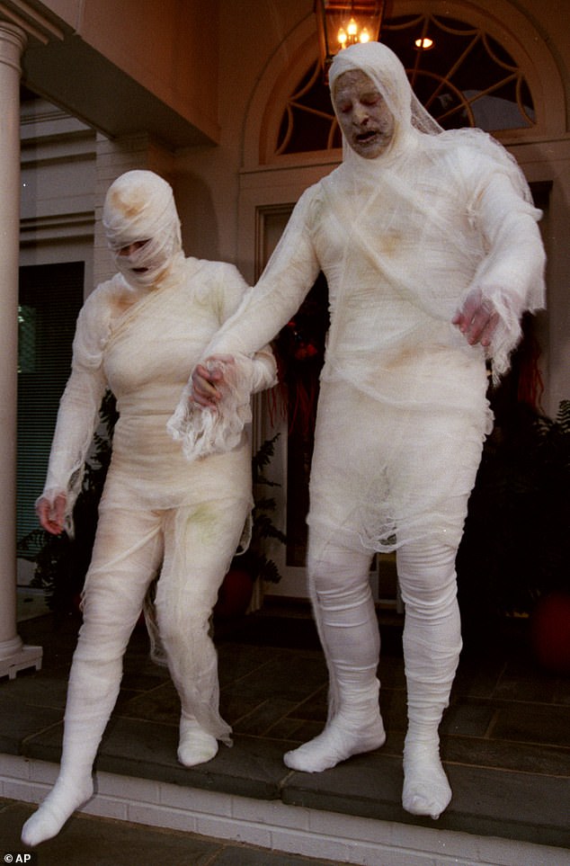 Al Gore, as vice president, and his wife Tipper held major Halloween events where they dressed in costume - above the couple in 1998 dressed as mummies