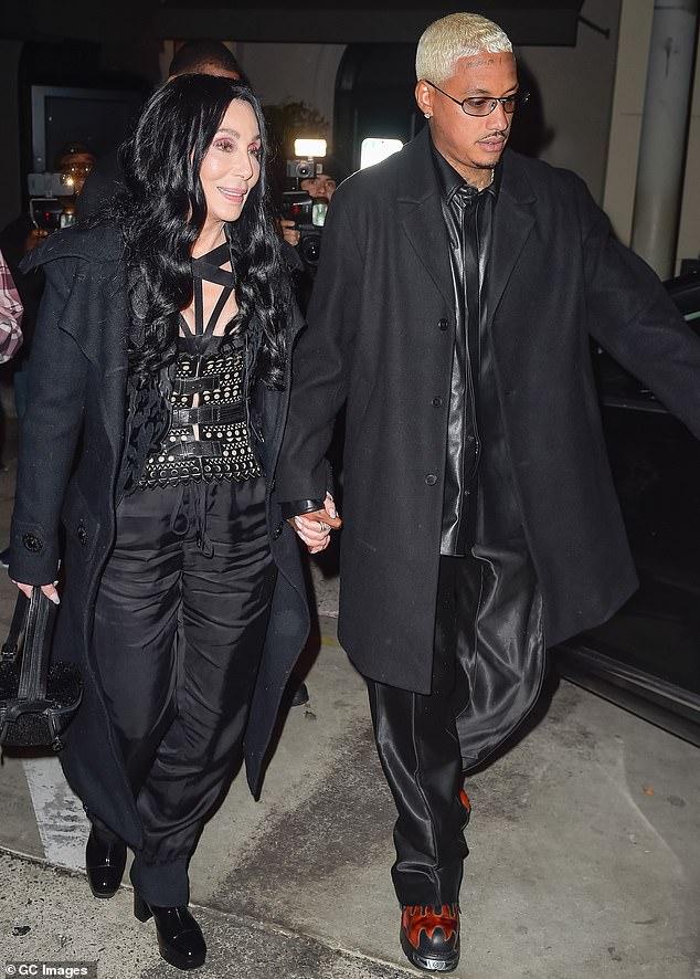 “If I hadn't met younger men in my life, I would never have dated because older men just didn't like me that much,” said Cher, pictured with her boyfriend Alexander Edwards, 38, in 2022