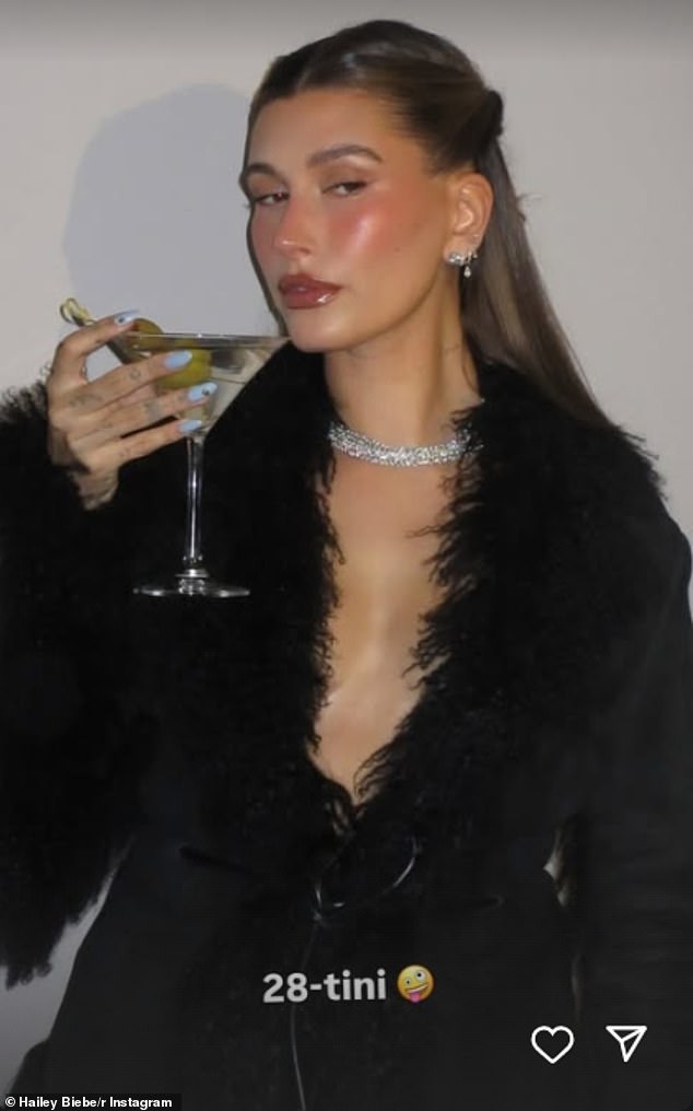 On Friday night, the model got all glam to celebrate in a very sexy all-black ensemble, which consisted of a fur-trimmed jacket, tiny shorts, tights and a pair of slingback heels.