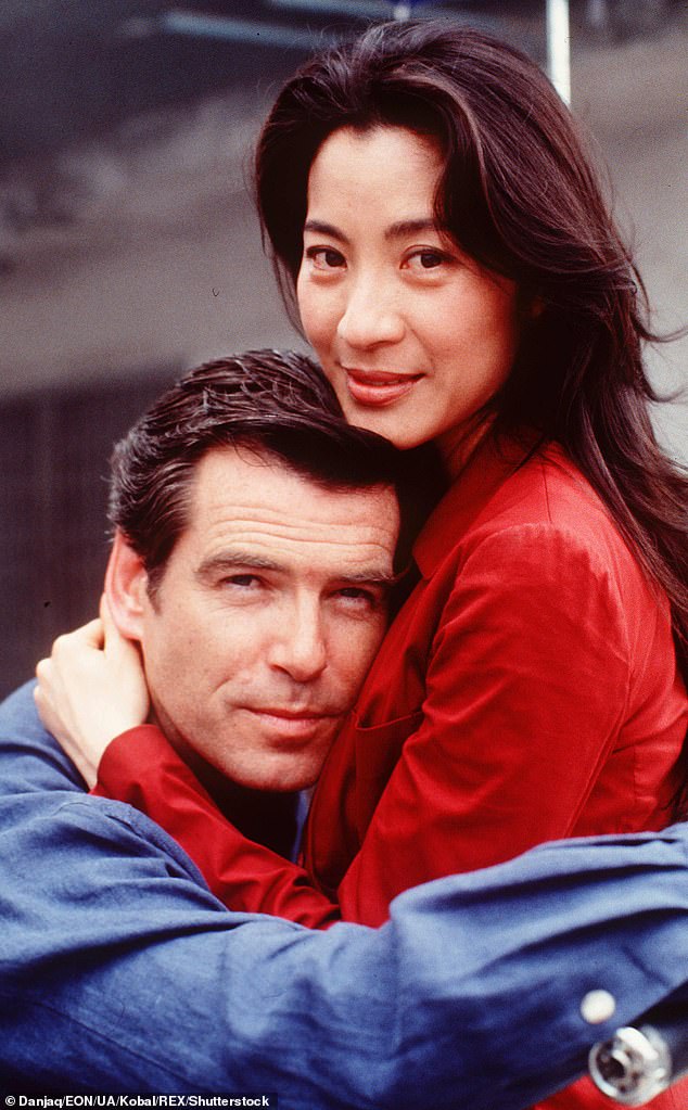 At the time of Tomorrow Never Dies' release, the Bond franchise made a determined effort to appeal to a female audience and shake off its sexist image. Pictured: Brosnan and Yeoh in a scene from the film