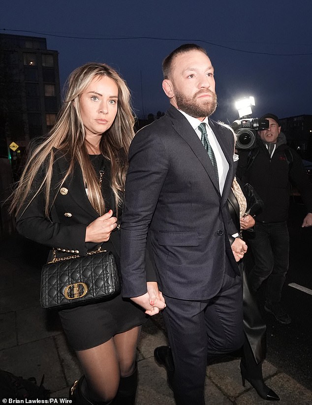 McGregor and his partner Dea Devlin arrive at the High Court in Dublin for the personal injury case against him