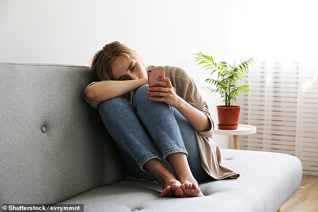 Other research has suggested that internet use in young people may be linked to increased anxiety, low self-esteem, eating disorders and online harassment (stock image)