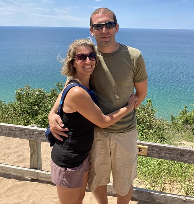 Meanwhile, his devastated wife Emily and their three children mourn their loss, believing he had probably been dead for months. In the photo: Borgwardt with his wife Emily