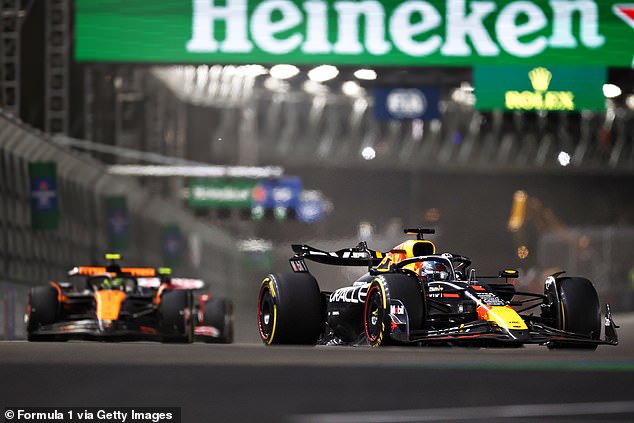 Max Verstappen (right) finished behind Norris but was still crowned world champion