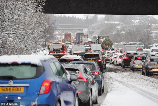 A combination of torrential rain, gale-force winds and rapidly melting snow has led to more than 200 flood warnings in England, Wales and Scotland