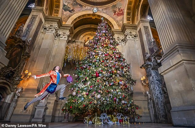 Pictured: A 23-foot Christmas tree that is part of the Alice's Christmas Wonderland installation at Castle Howard, near York, November 13, 2024