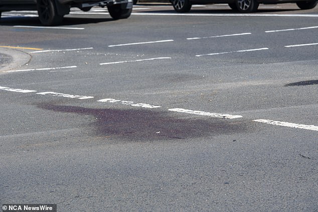 Images from the scene showed bloodstains on the road near the petrol station in Surry Hills