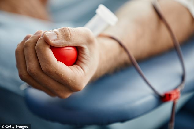 A close-up of a man donating blood. About 47,500 donors give blood every week, and hospitals need about 113,000 donations per month, but the short shelf life means supplies must be constantly replenished