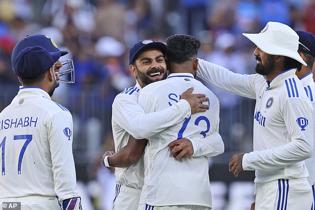 Australia ended the day behind the visitors by 522 runs, with Jasprit Bumrah's side making a statement after a stunning innings that saw both Virat Kohli (third from left) and Yashasvi Jaiswal hit 100s.