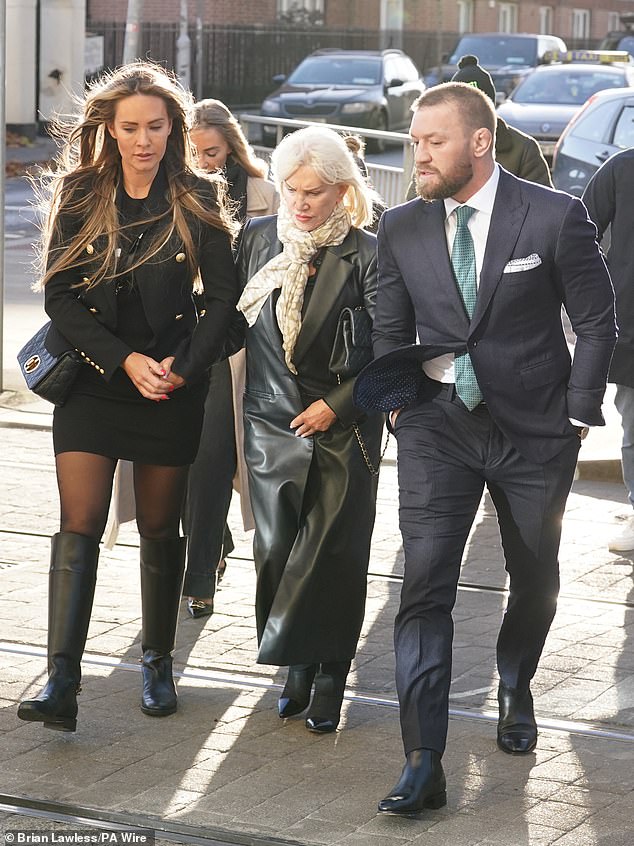 Conor McGregor and partner Dee Devlin and mother Margaret outside the High Court in Dublin, November 22, 2024