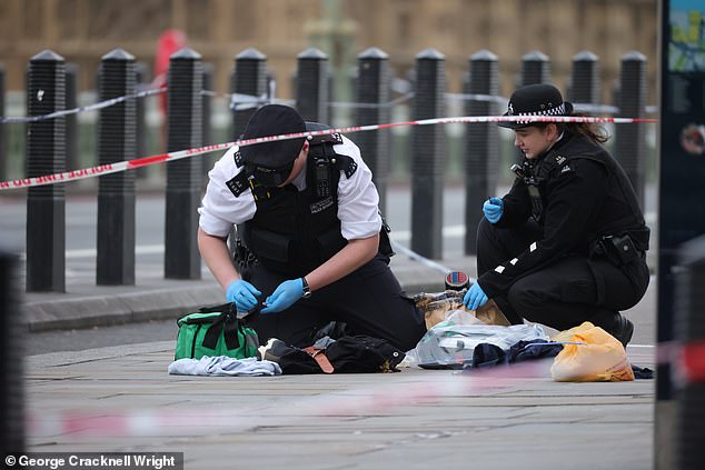 Police are today gathering evidence at the scene on Westminster Bridge