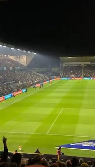 A group of Championship team fans were heard repeatedly chanting from the stands: 'She's getting s****ed in the jungle'