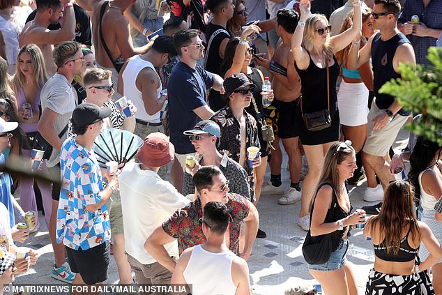 Men went to the dance very casually, some even bringing hand fans to beat the heat