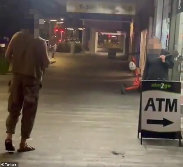 Footage of the heated confrontation showed the shopkeeper brandishing a shovel while shouting obscenities at tourists