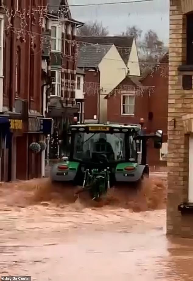 Locals were furious and branded the inconsiderate driver a 't***er' for causing a flood of brown water that soaked businesses in Tenbury Wells, Worcestershire.