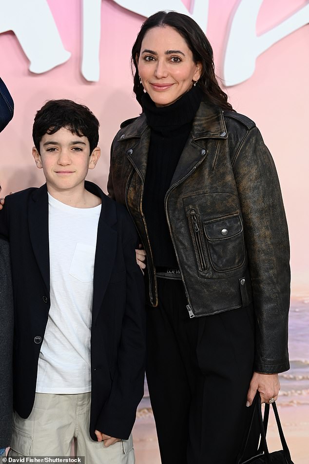 Simon Cowell's partner Lauren Silverman also made a rare appearance with their son Eric, 10