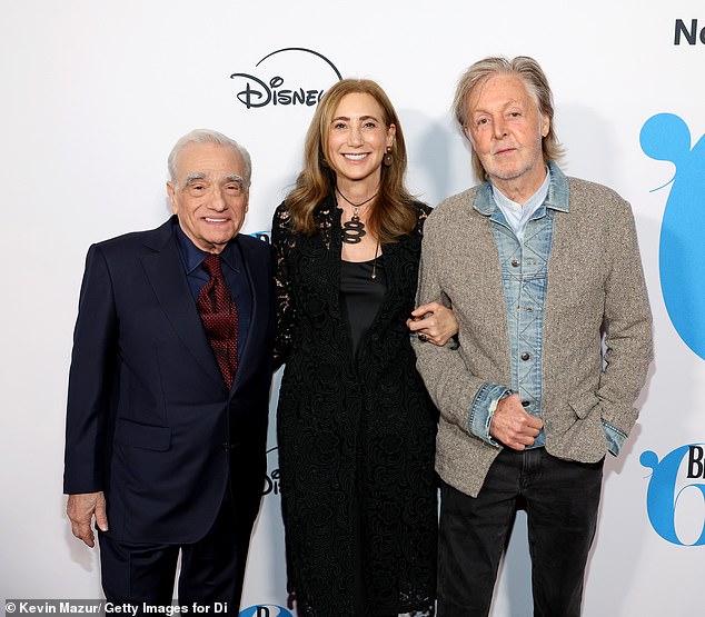 They were also joined by filmmaker Martin Scorsese, 82. He looked dapper in a navy suit, which he teamed with a matching button-down shirt and a contrasting scarlet red polka dot tie.