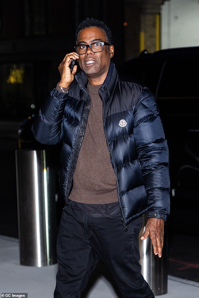 Arriving at the Hudson Square Theater, Rock, 59, looked effortlessly stylish in a cozy, navy Moncler puffer jacket as he walked and talked on the phone