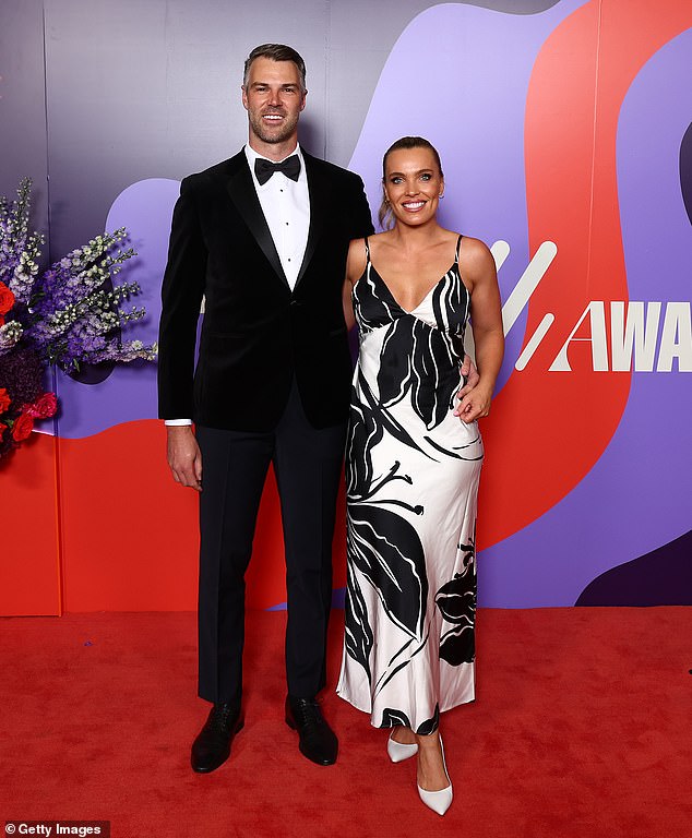 Abbey Holmes stunned as she posed next to her date, footballer Keegan Brooksby, who looked dapper in a tuxedo