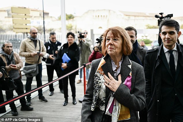 Gisele Pelicot (C), flanked by her lawyer Stephane Babonneau (R), arrives at the Avignon courthouse today for the trial