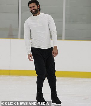 The TV personality wore a white quarter-zip and black sweatpants for another long day of rehearsals