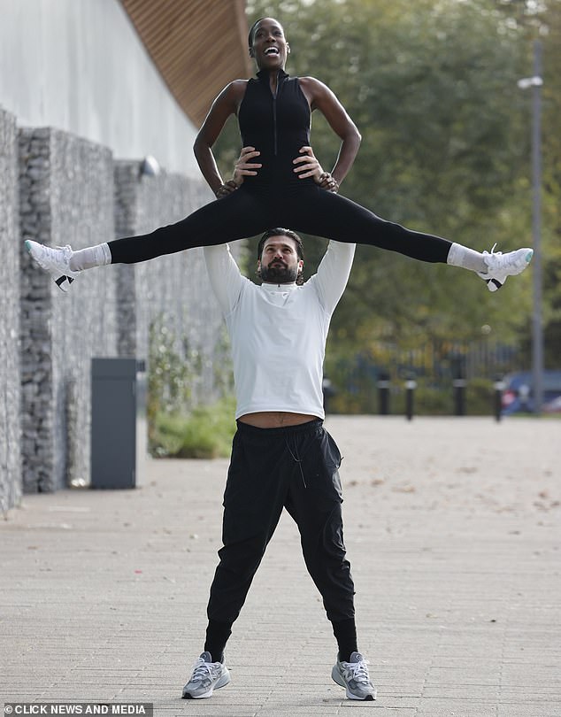 In another move, Vanessa did the splits while being held above Dan's head