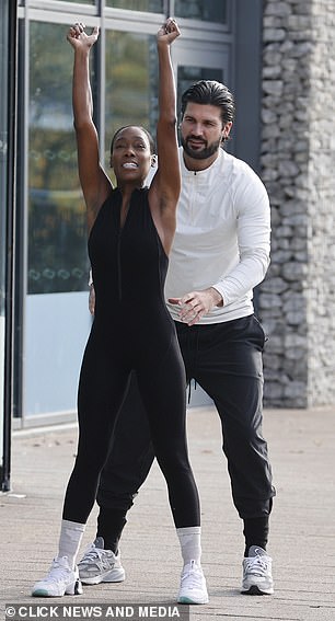 Vanessa looked fantastic in a black swimsuit while working out