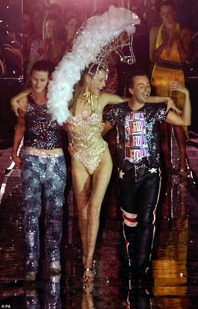 Georgina Cooper, centre, on the catwalk with Julien MacDonald in 2000