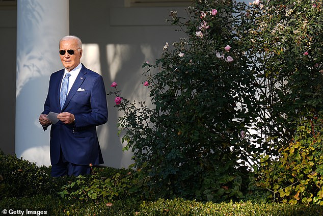 Biden walks to the Oval Office before pardoning the National Thanksgiving turkeys