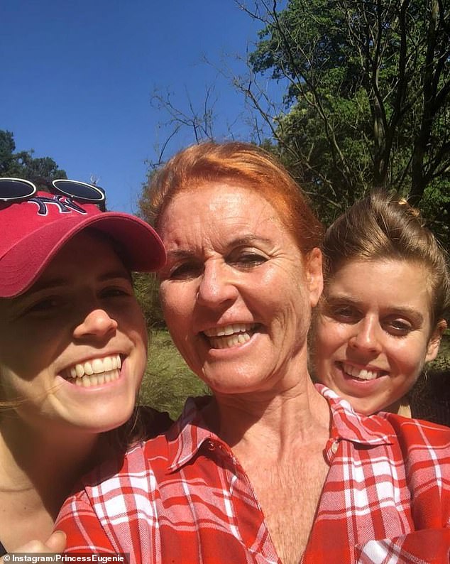 Eugenie, Sarah and Beatrice pose and laugh together for a photo in the sun