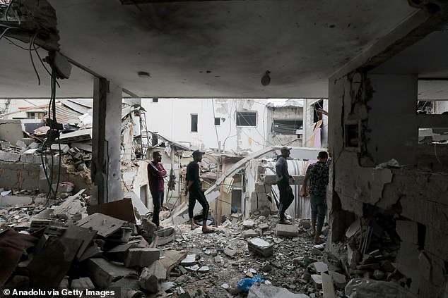 A view of the destruction following an Israeli airstrike on a building in the Nuseirat camp in the Gaza Strip on November 24, 2024