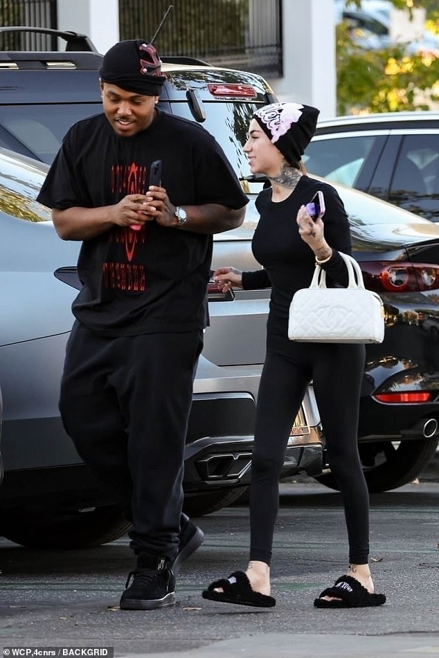 As the pair walked back to their car, Bhabie looked noticeably thinner as she stayed close to her baby daddy, 26, while wearing an all-black outfit.