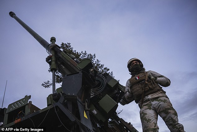 French soldiers of the 93rd Mountain Artillery Regiment operate the CAESAR, a French self-propelled howitzer capable of firing 39/52 caliber NATO standard during Dynamic Front