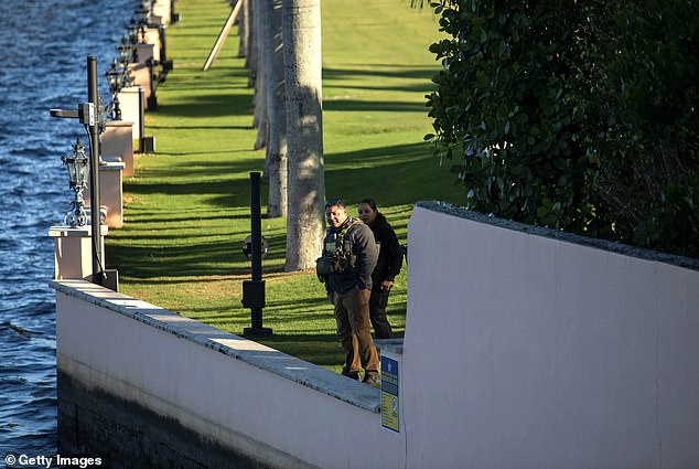 Law enforcement officers outside President-elect Donald Trump's Mar-a-Lago resort on November 23, 2024 in Palm Beach, Florida