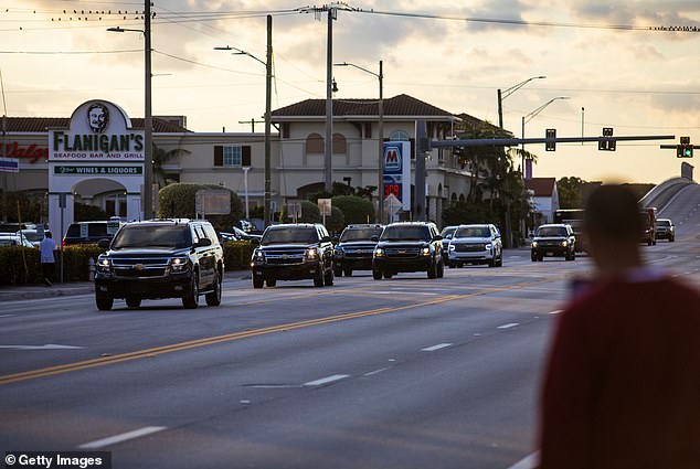 A convoy of vehicles heads toward President-elect Donald Trump's Mar-a-Lago resort in Palm Beach, Florida, on November 24, 2024