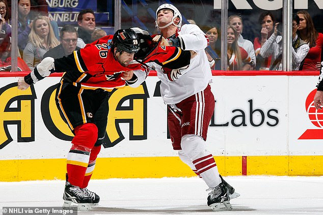 Bissonnete (right, seen in 2012) became known for fighting opponents in the NHL