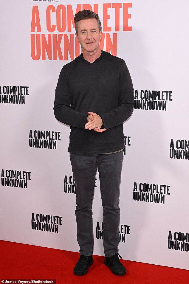 The Fight Club star wore a dark, thin hoodie, which he layered over a light gray T-shirt