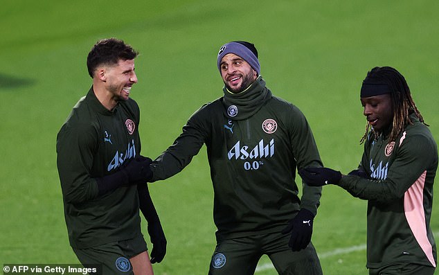 The good news is that Ruben Dias (left) and Jeremy Doku (right) are back in training for City