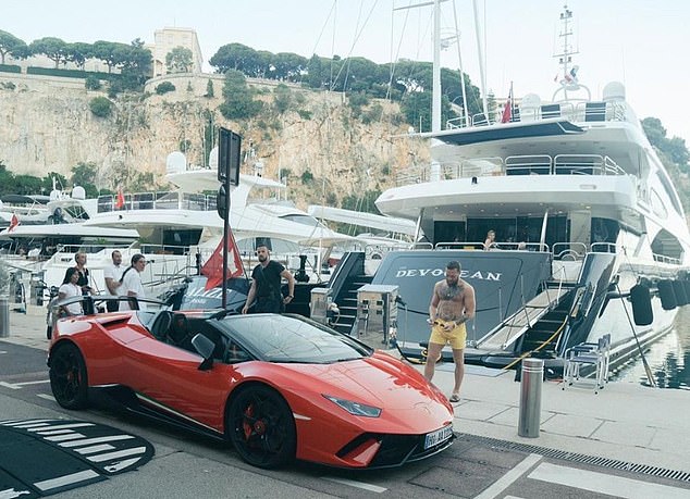 McGregor shows off a £220,000 red Lamborghini, one of a number of supercars he owns