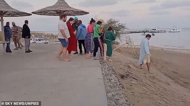 The boat was carrying 31 tourists of different nationalities - including four British and two Americans - and 13 Egyptian crew members on board, local media reported Masrawy (photo: people waiting on the beach for survivors)