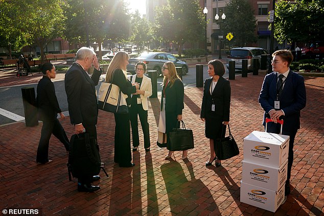 Members of Google's legal team wait outside the courthouse