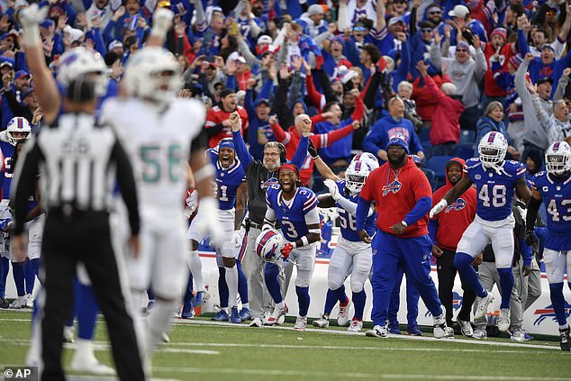 Bills players react after kicker Tyler Bass kicked the game-winning field goal against Miami