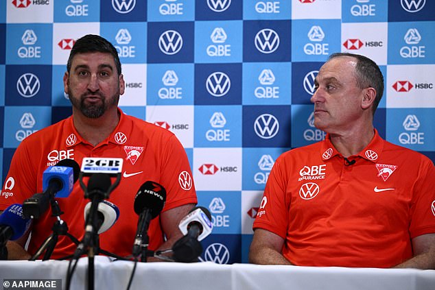 Dean Cox (left) will succeed Longmire (right) as the club's new senior coach, with Cox apparently having already overseen the Swans' draft