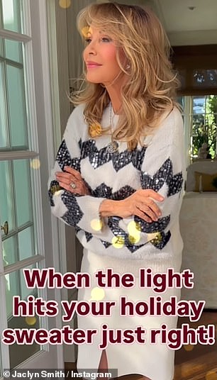 In her new video, she stood by the window, allowing sunlight to shine on her sequined Christmas sweater