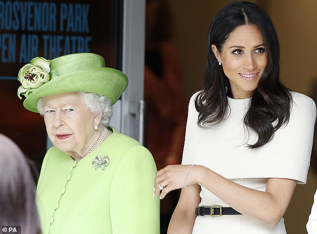 Meghan is pictured during her first engagement, a visit to Chester with Her Majesty in June 2018