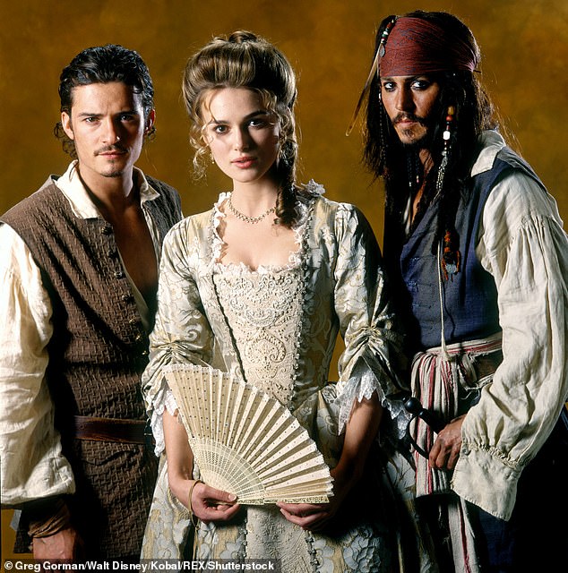 Keira (center) appeared in the films alongside Johnny Depp (right) and Orlando (left)